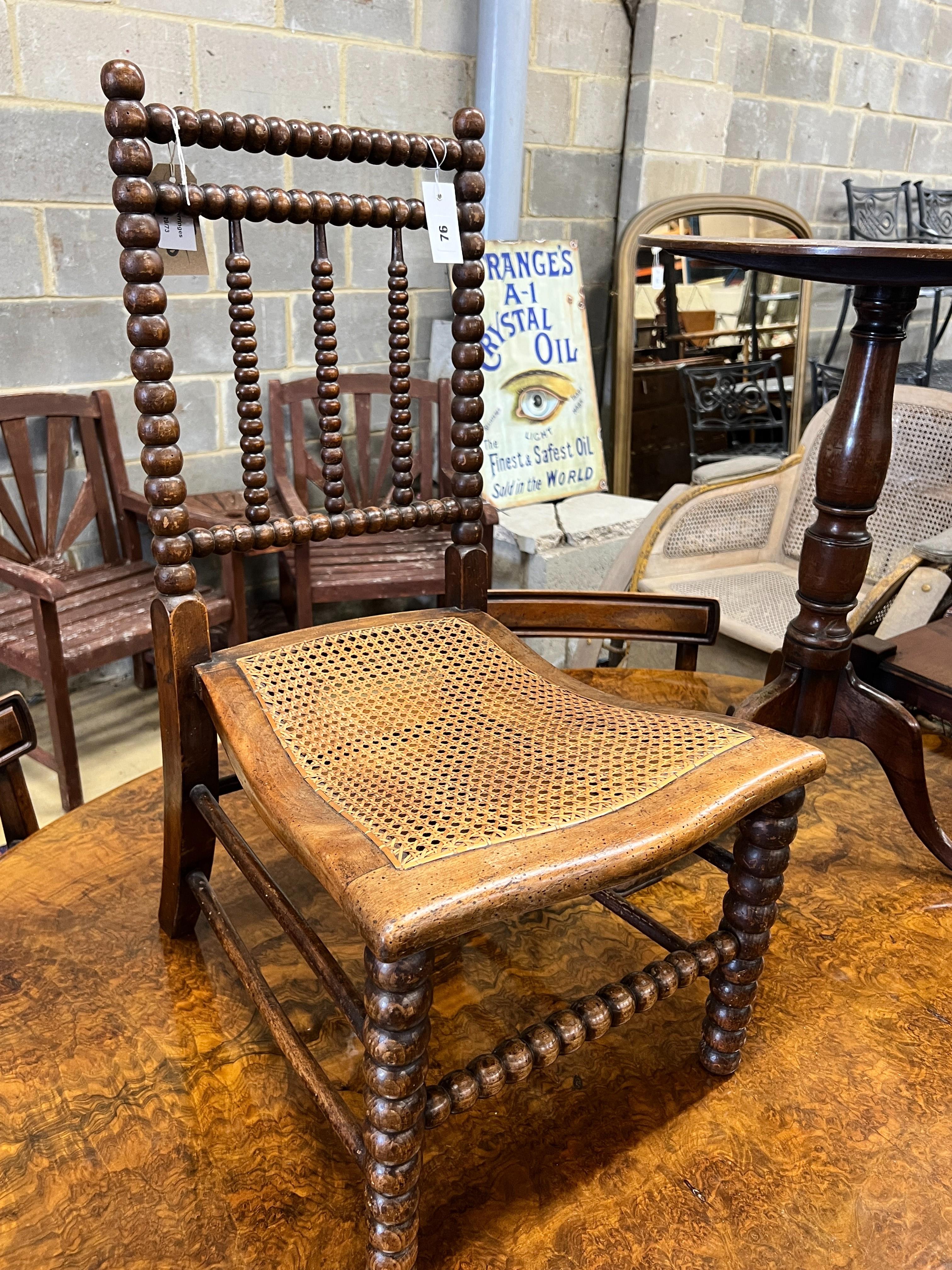 A Victorian bobbin turned rush seat chair